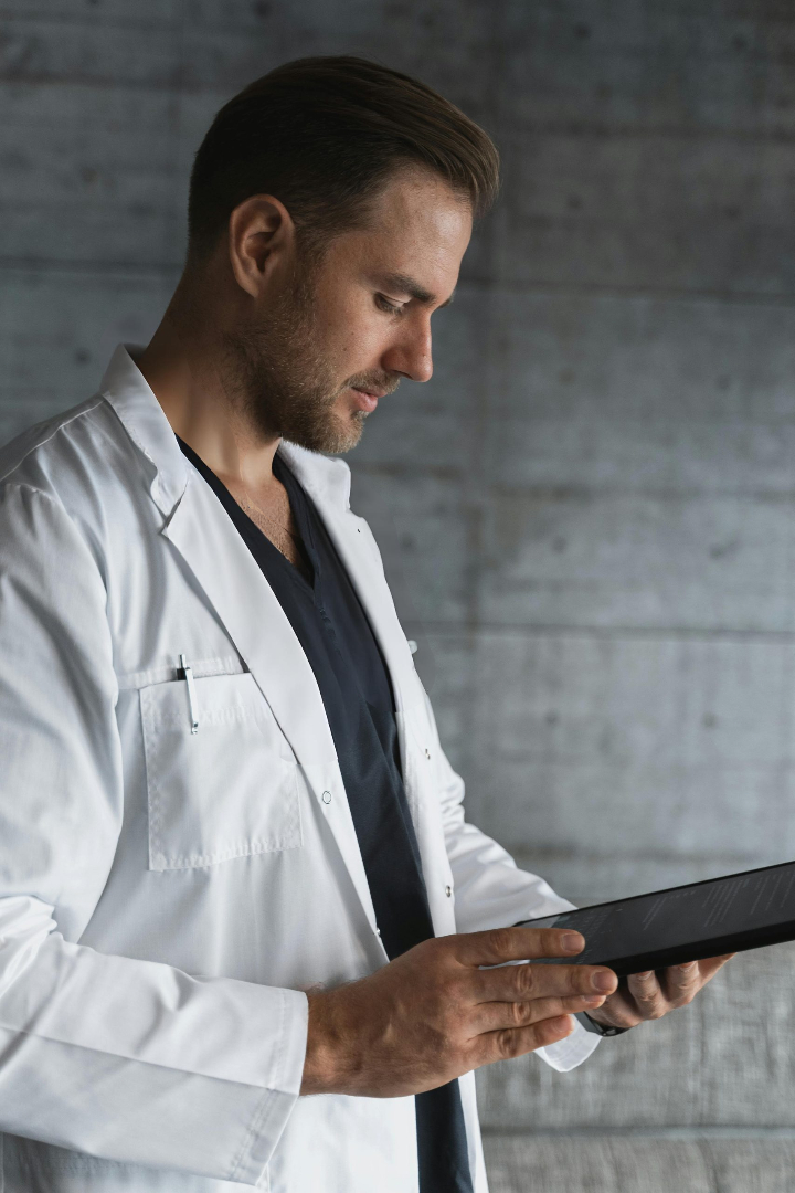 Doctor reviewing information on a tablet